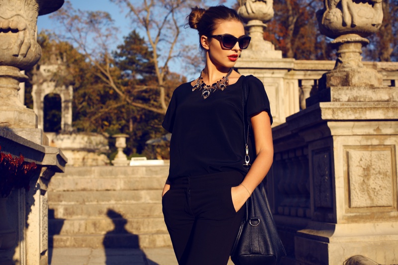 Fashionable Woman All Black Outfit Statement Necklace