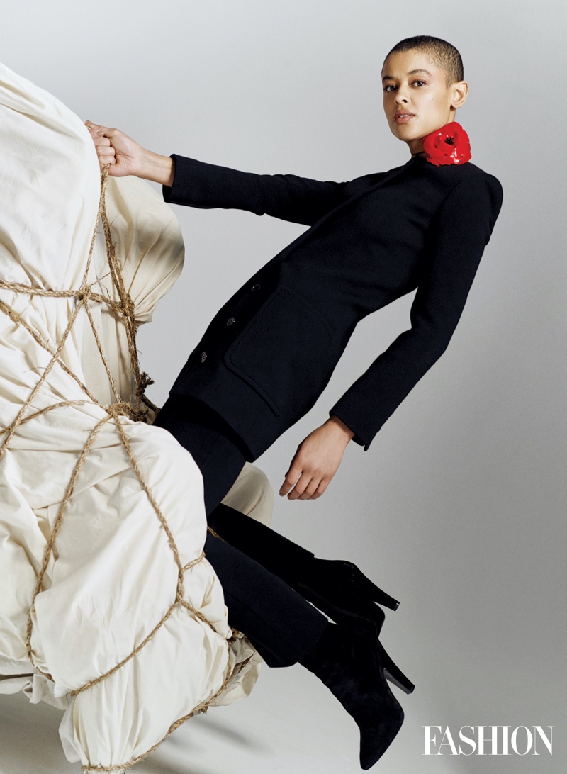 Striking a pose, Jordan Alexander poses in Saint Laurent look.