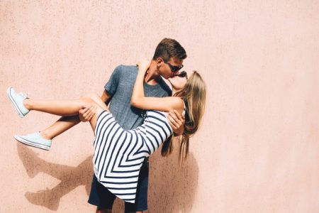 How to Find Your Perfect Match: 8 Key Tips Man Holding Kissing Girlfriend Couple Young