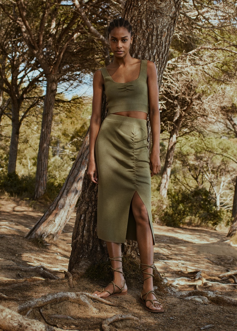 Karly Loyce poses in neutral fashion for Mango Committed Effortless spring-summer 2021 