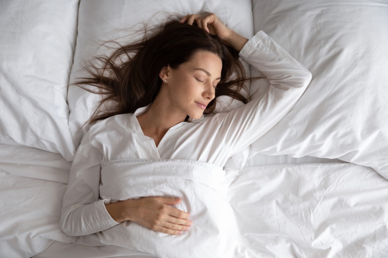Sleeping Brunette Woman Bed Sheets
