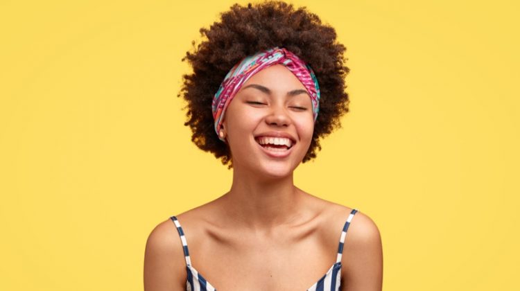 Smiling Model Headband Striped Top Afro Hairstyle