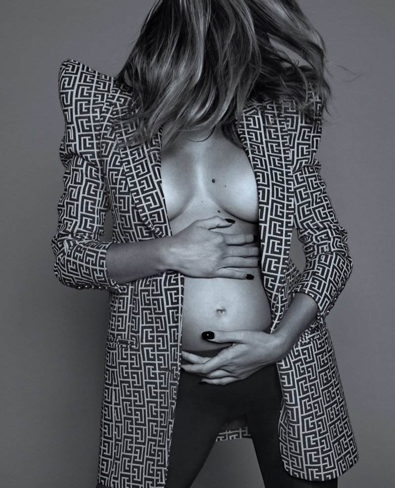 Valentina Ferrer cradles her pregnant stomach. Photo: An Le / Vogue Mexico