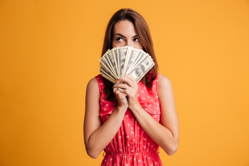 Woman Holding Cash Money Red Dress