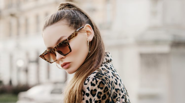 Woman in Leopard Print Sunglasses and Jacket