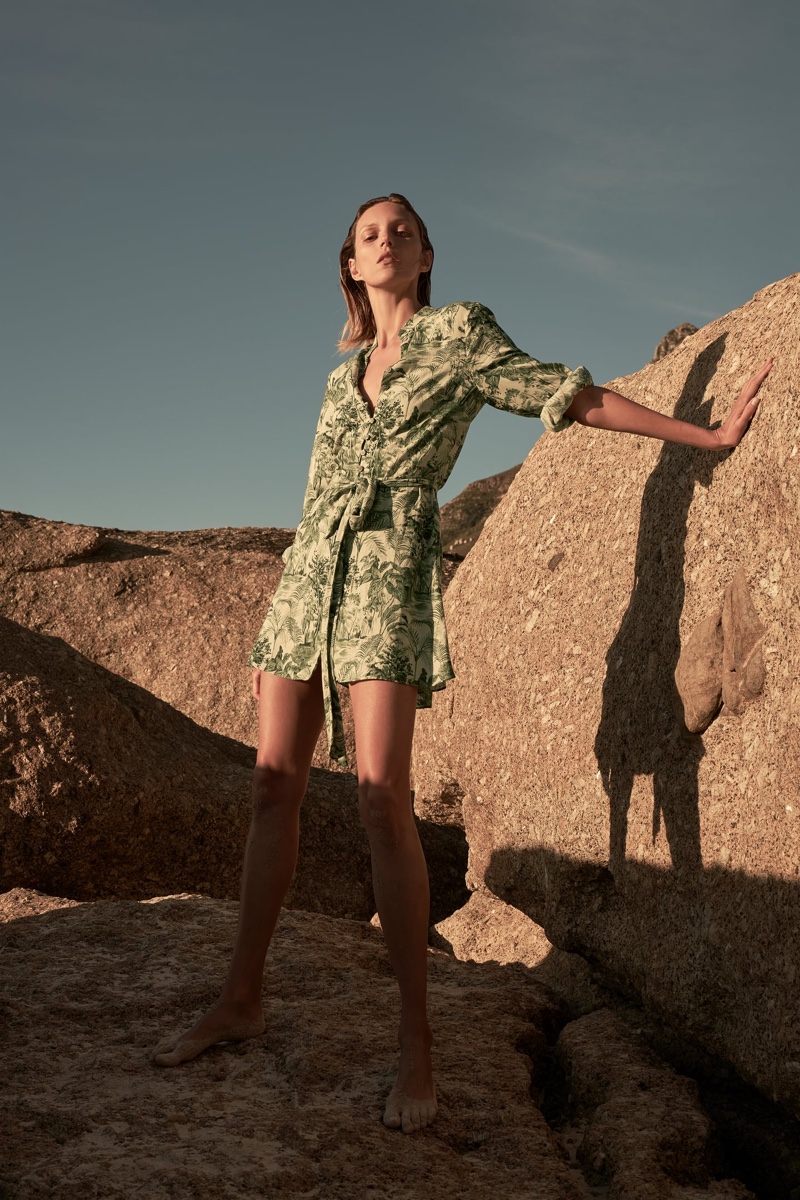 Posing at the beach, Anja Rubik wears Zara printed shirt dress.