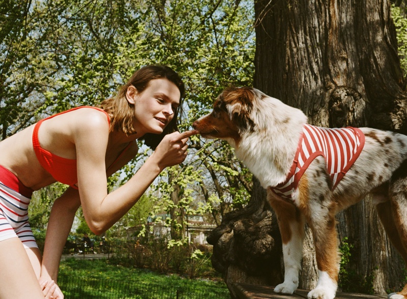 Model Cara Taylor poses with Choochie the dog for Zara.