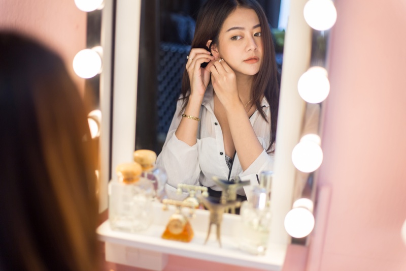 Asian Woman Looking Vanity Mirror
