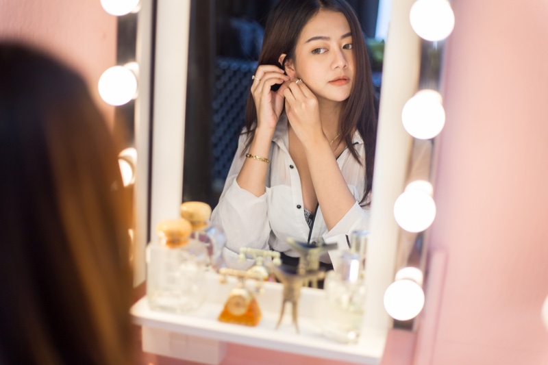 Asian Woman Looking Vanity Mirror