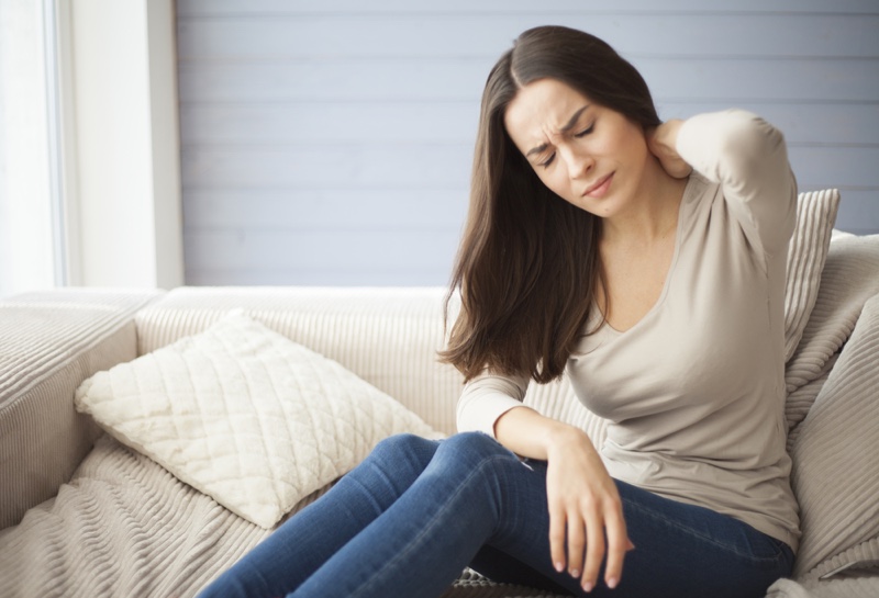 Attractive Woman Pained Couch back
