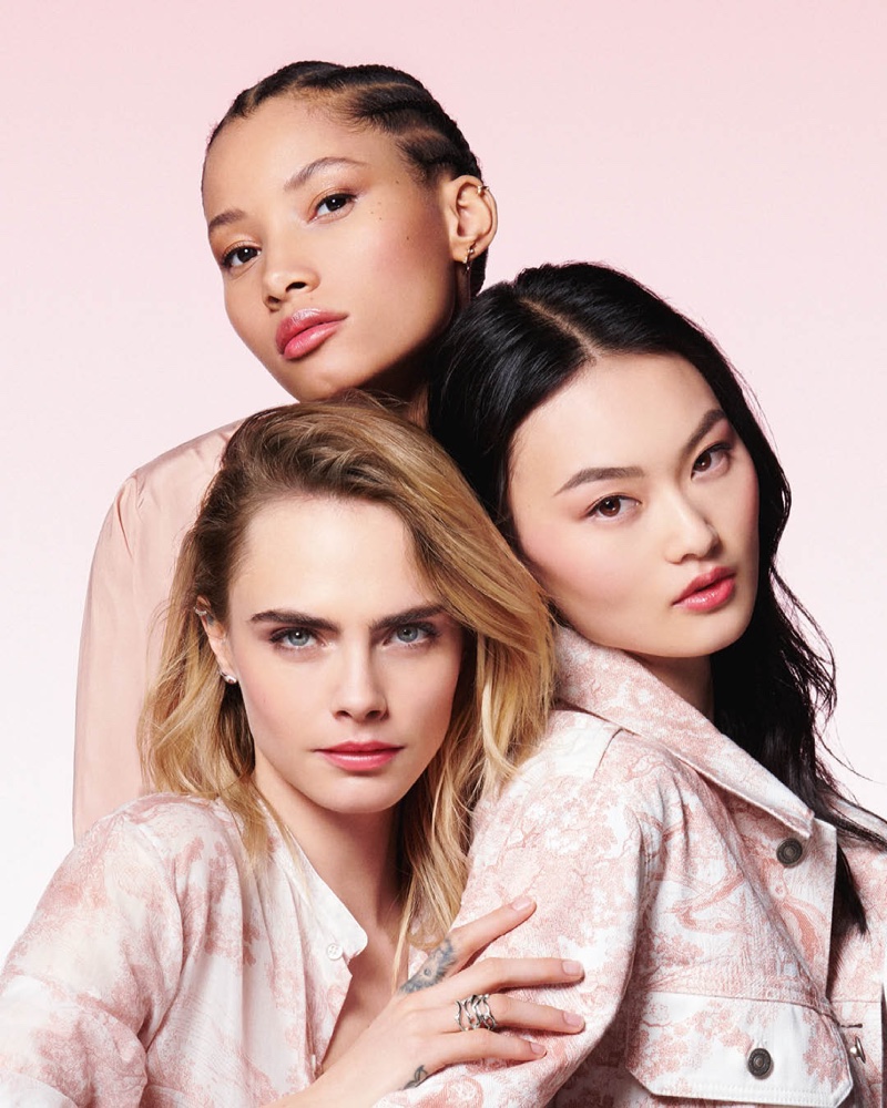 Models Cara Delevingne, He Cong, and Lineisy Montero pose for Dior Addict Lip Glow campaign.
