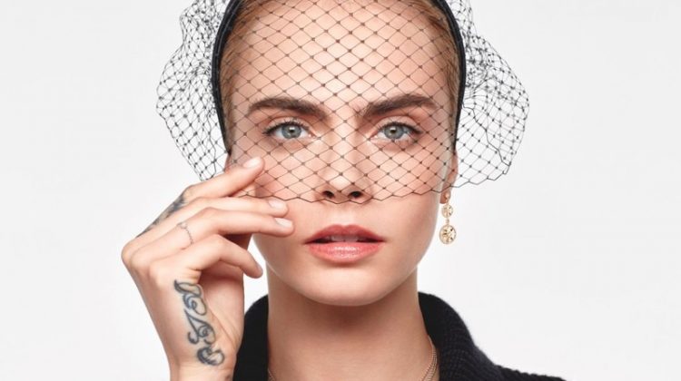 Wearing a veil, Cara Delevingne fronts Dior Rose Des Vents 2021 jewelry campaign.