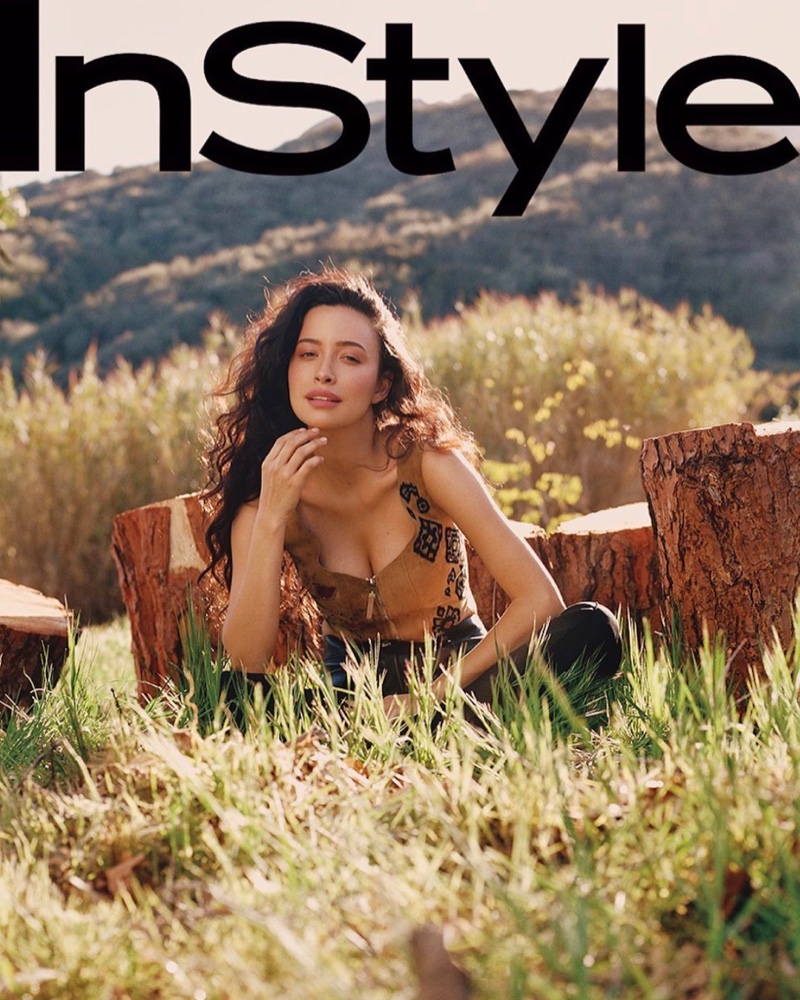 Posing outdoors, Christian Serratos graces the pages of InStyle Mexico.