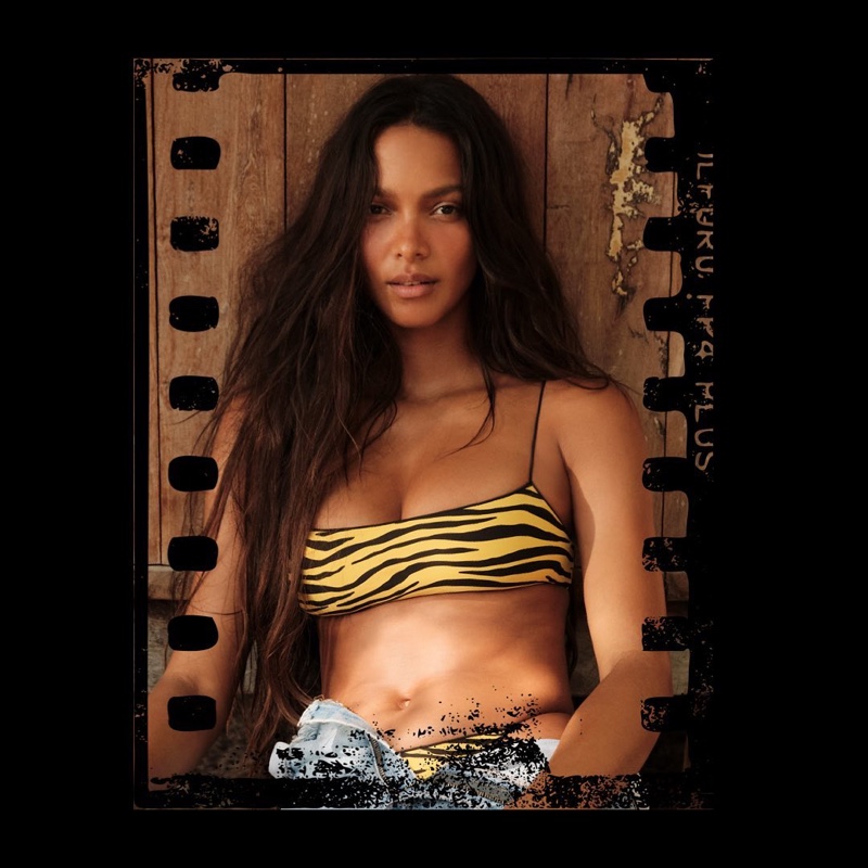 Lais Ribeiro wears Tropic of C bikini set in zebra print.