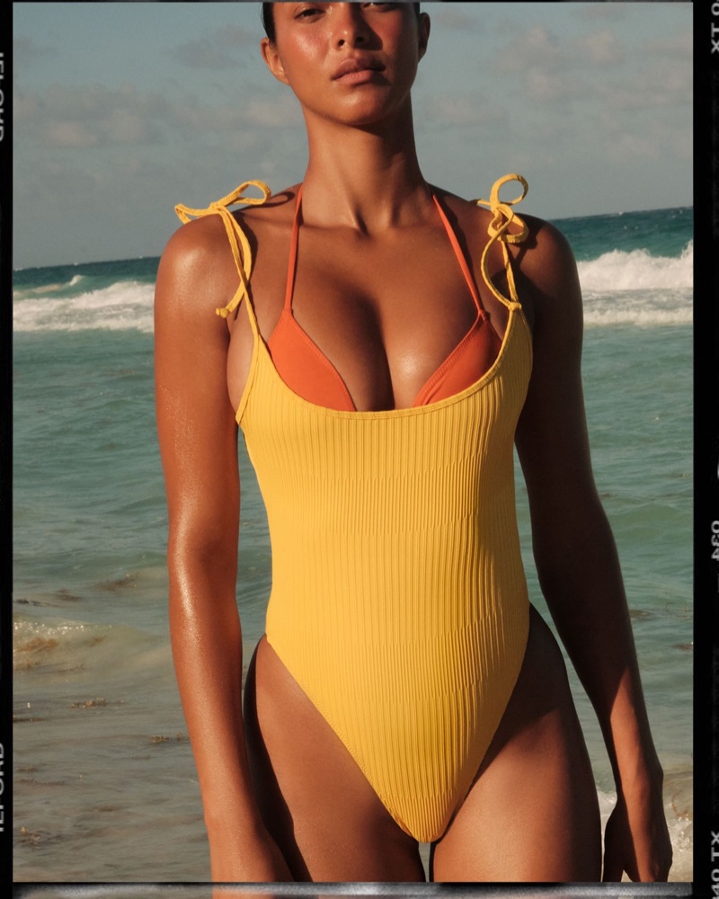 Tropic of C features Bo one-piece in mango.