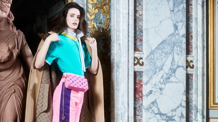 Stacy Martin poses with Pochette Coussin bag in Louis Vuitton pre-fall 2021 campaign.