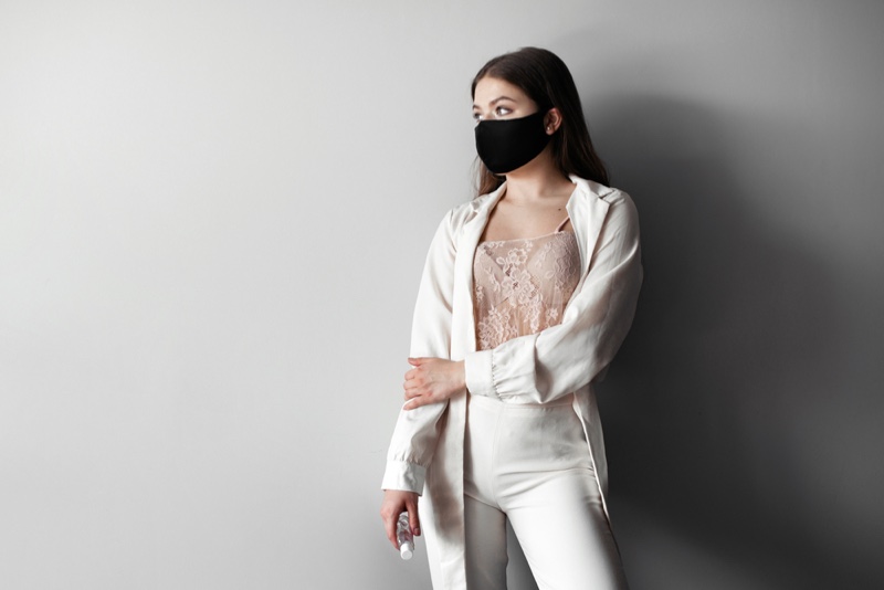 Model Black Face Mask White Jacket Pants Outfit