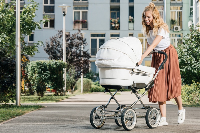 Mother Smiling Walking baby Stroller