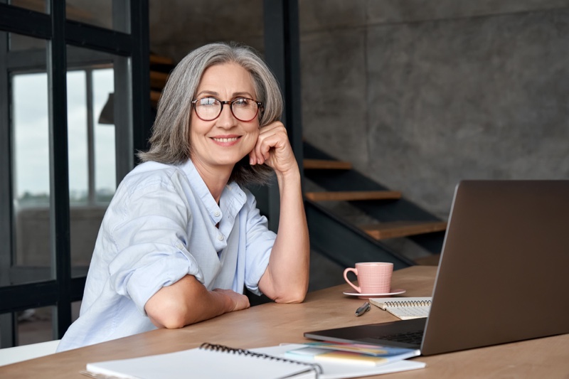 Older Woman Grey Hair Glasses Sitting Laptop