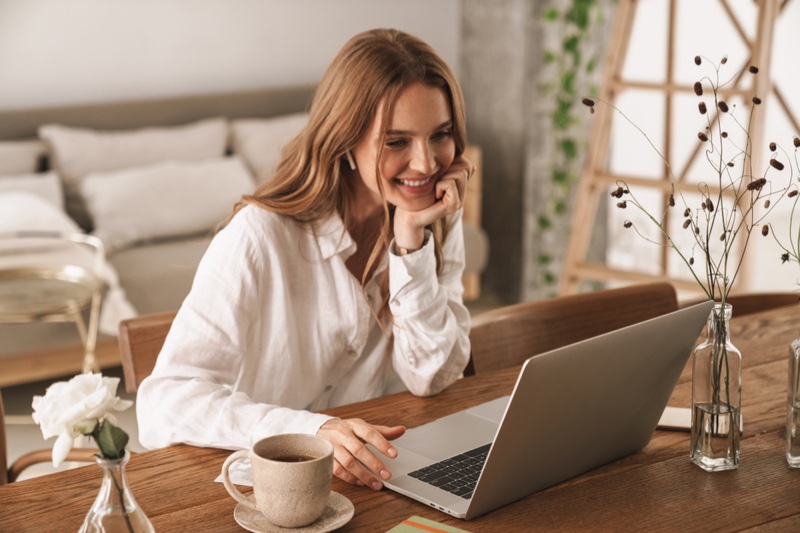 Smiling Woman Fashionable Looking Laptop Table