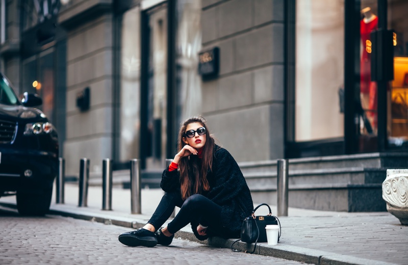 Stylish Woman Black Outfit Sitting Street