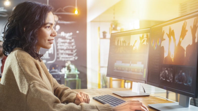 Woman Editing Video Computer