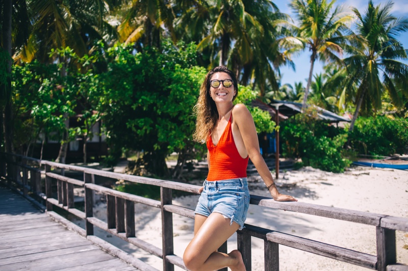 Woman Red Swimsuit Denim Shorts Beach