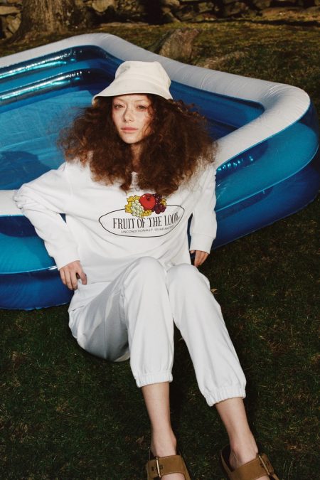 Sara Grace Wallerstedt Lounges in Zara x Fruit of the Loom Collaboration Sara Grace Wallerstedt poses in Zara x Fruit of the Loom collaboration.