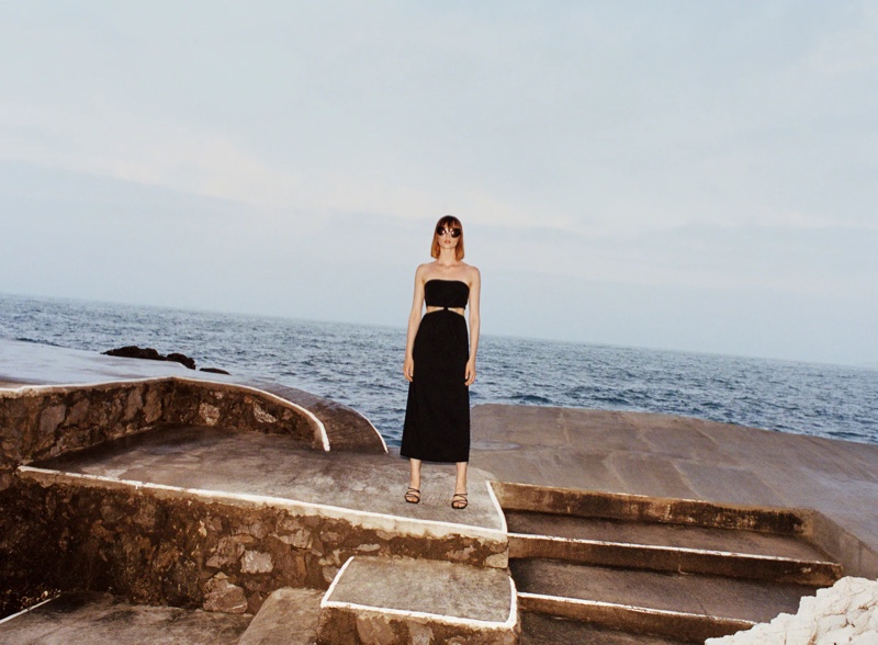 Posing seaside, Aylah Peterson wears a little black dress from Zara.