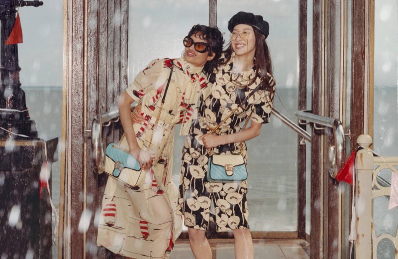 Gucci features rainy weather in Towards the Sun summer 2021 campaign.