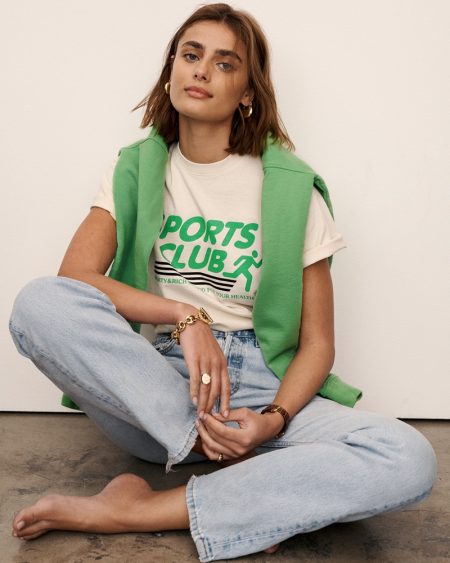 Taylor Hill is Casual Chic in Sporty & Rich Summer 2021 Campaign Taylor Hill poses for Sporty & Rich summer 2021 campaign.