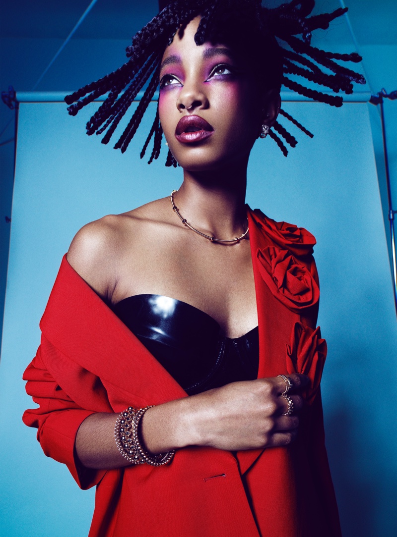 Willow Smith stands out in embellished red jacket.