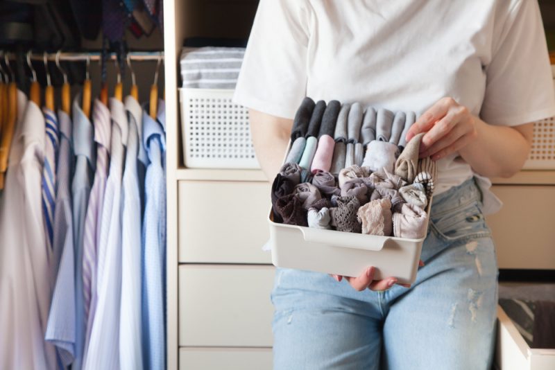 Woman Sorting Underwear