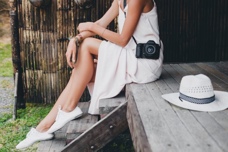 Woman Wearing Dress and Sneakers