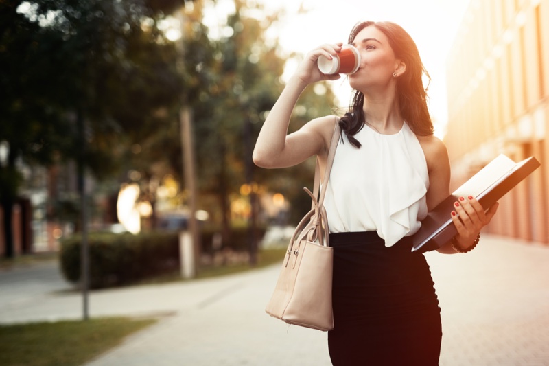 Working Woman Drinking Coffee White Shirt Black Skirt