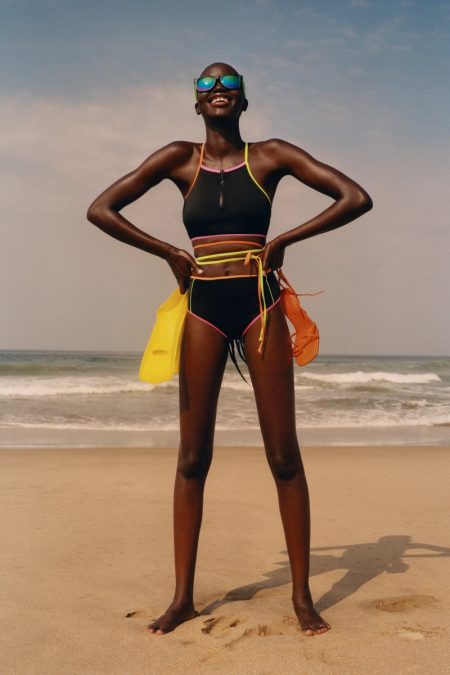 Neon Swim: Zara Gets Into Bold Beachwear Zara Cross Strap Bikini Top and High-Waisted Bikini Bottoms with Piping.