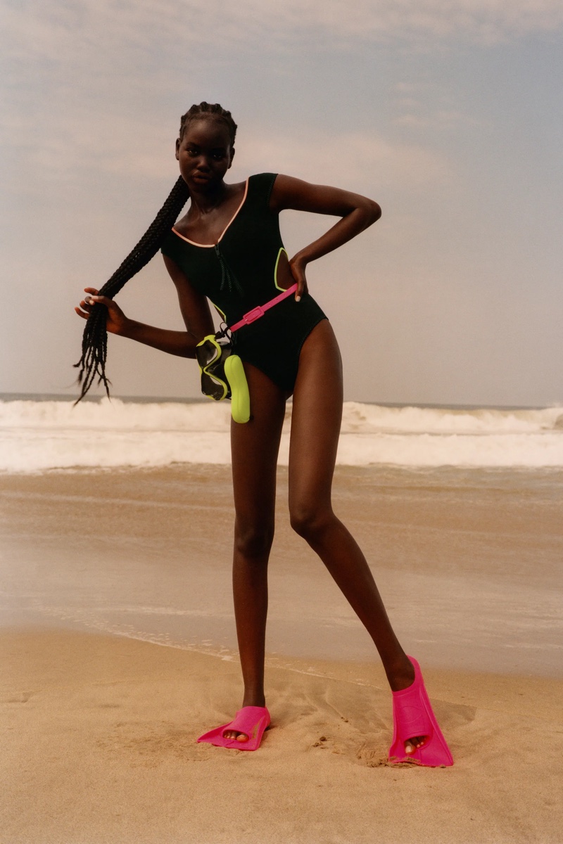 Adut Akech models Zara Cut Out Swimsuit and Glasses Case.