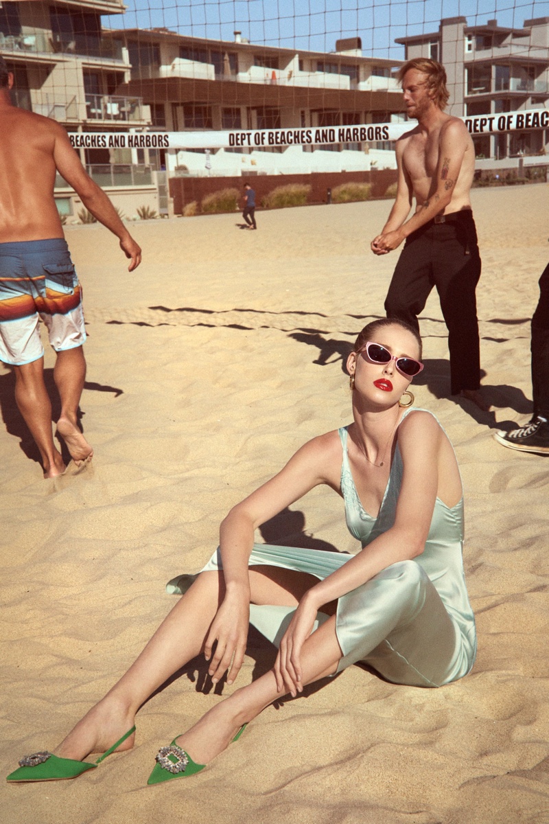 Abby Champion models Zara embroidered silk blend dress.