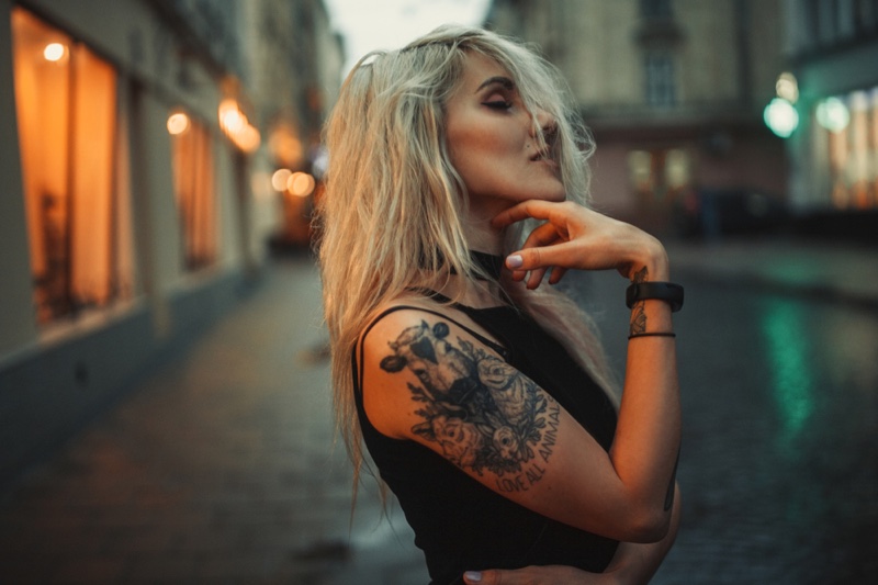 Blonde Girl Tattoo Arm Outdoors