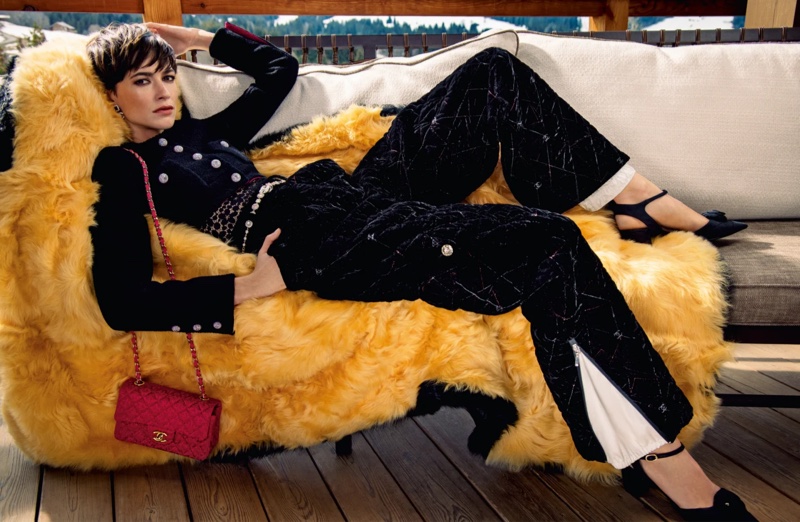 Louise de Chevigny lounges in Chanel fall-winter 2021 campaign.