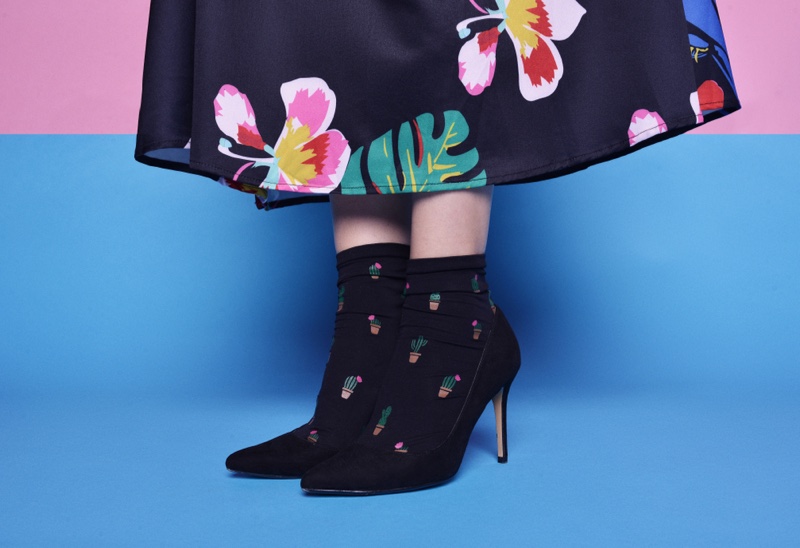 Closeup Woman Printed Socks Black Heels