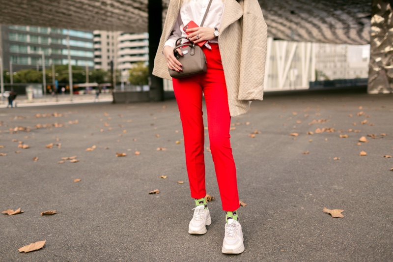 Cropped Woman Jacket Red Pants White Sneakers