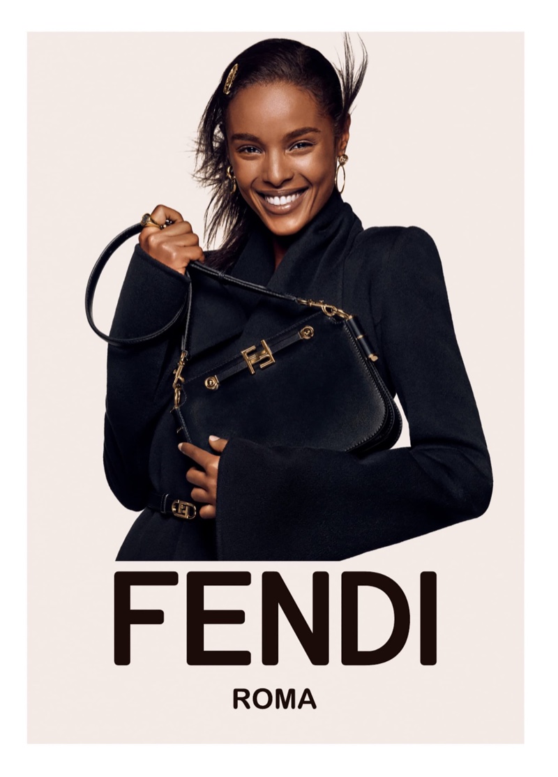 Malika Louback flashes a smile in Fendi fall-winter 2021 campaign.