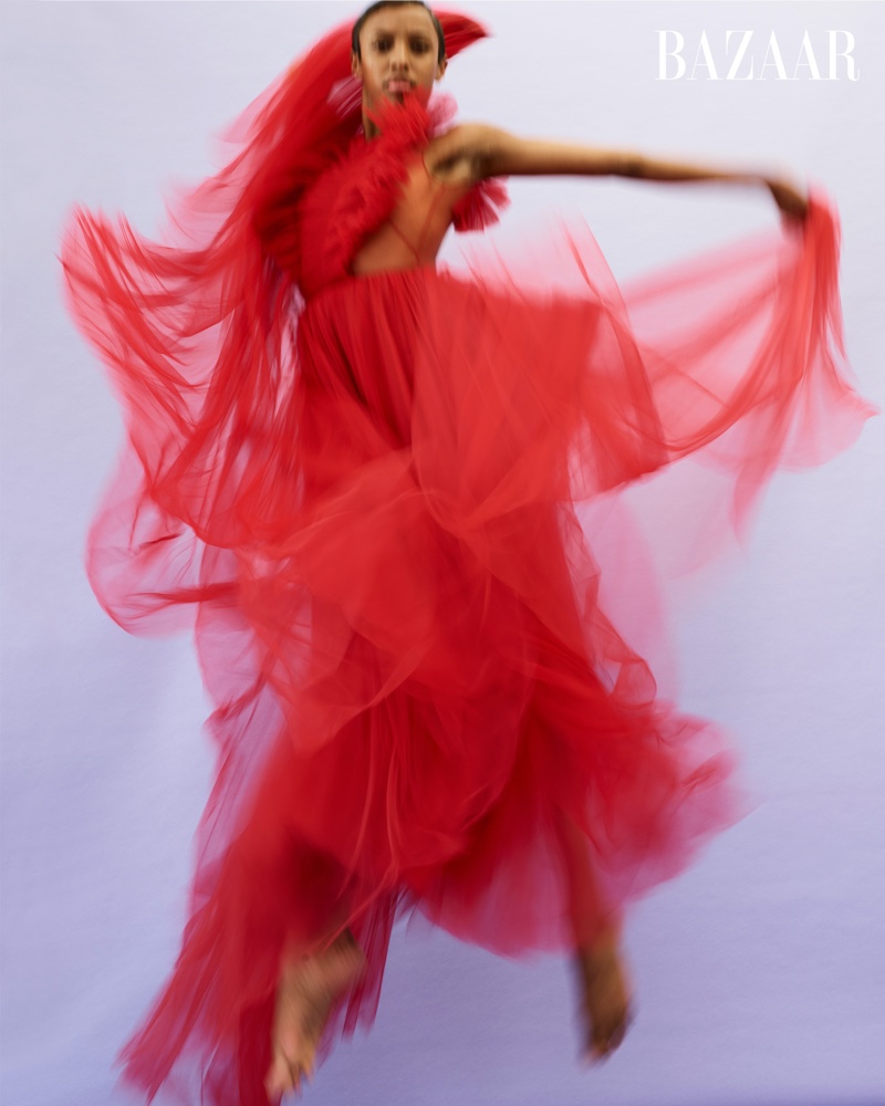 Courtney Celeste Spears of Alvin Ailey American Dance Theater shows her moves in red Dior dress.