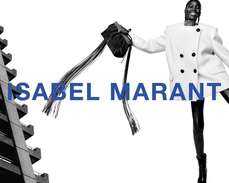 Model Adut Akech flashes a smile in Isabel Marant's fall-winter 2021 campaign.