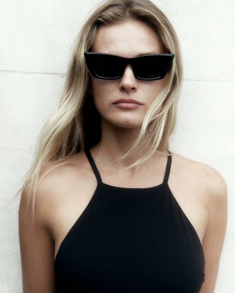 Edita Vilkeviciute Massimo Dutti halter neck swimsuit and cateye sunglasses.