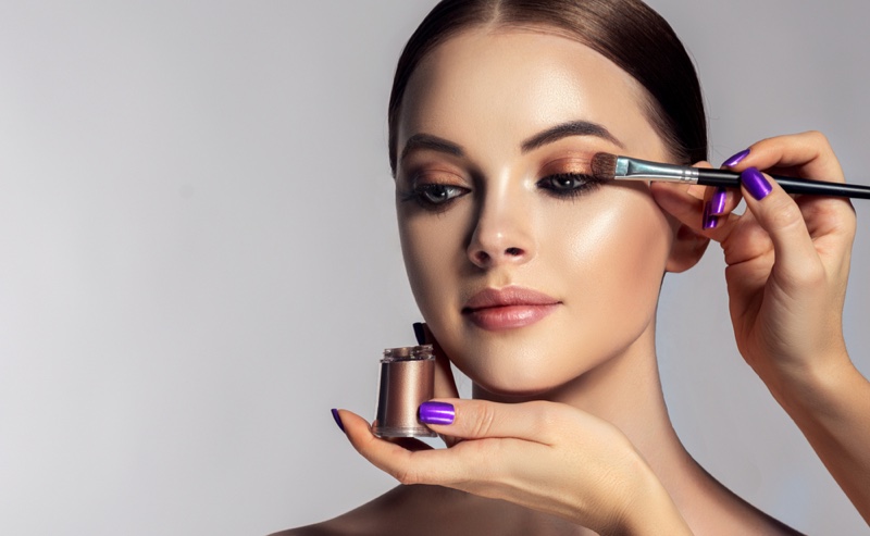 Model Getting Makeup Applied Eyeshadow Brush