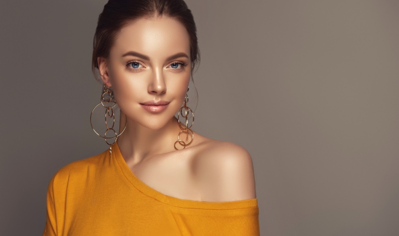 Model Gold Layered Hoop Earrings One Shoulder Top