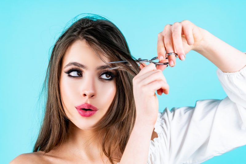 Woman Cutting Hair