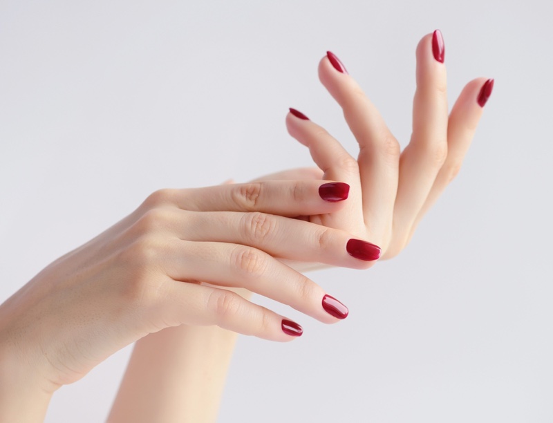 Woman Dark Red Nails Manicure